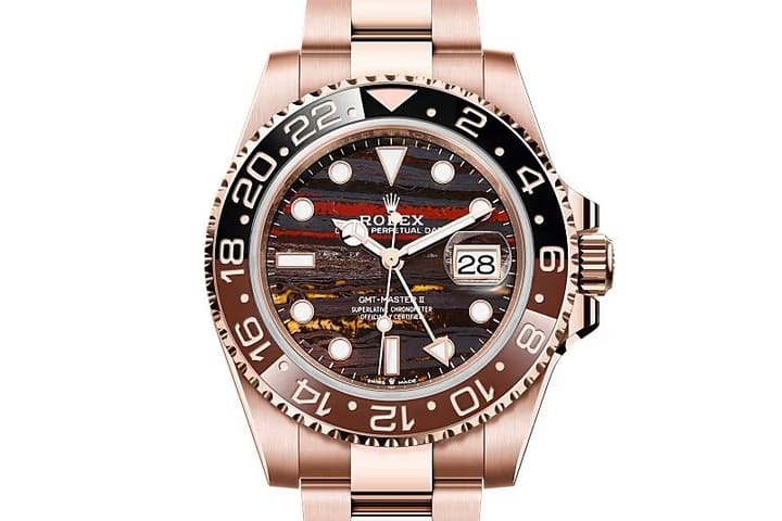 Rolex GMT-Master II in rose gold with tiger-iron dial